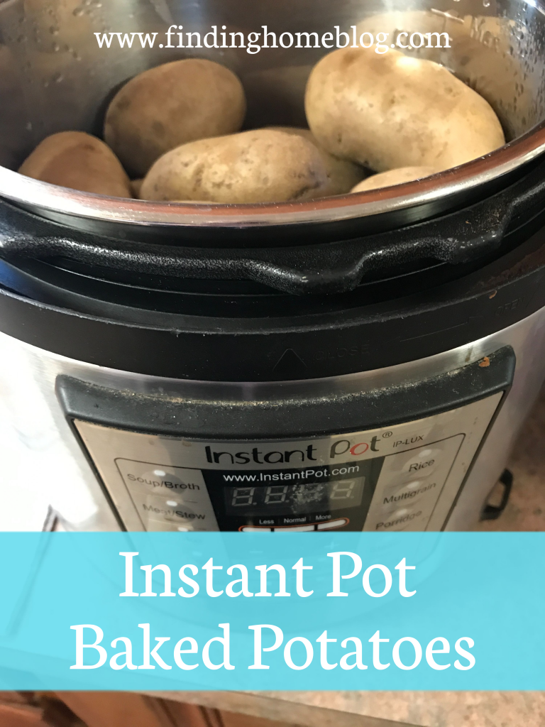 An instant pot full of baked potatoes. A banner across the bottom reads "Instant Pot Baked Potatoes".