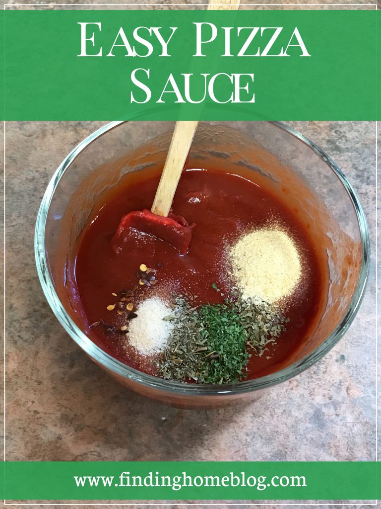 Pizza sauce with spices in small mounds before mixing