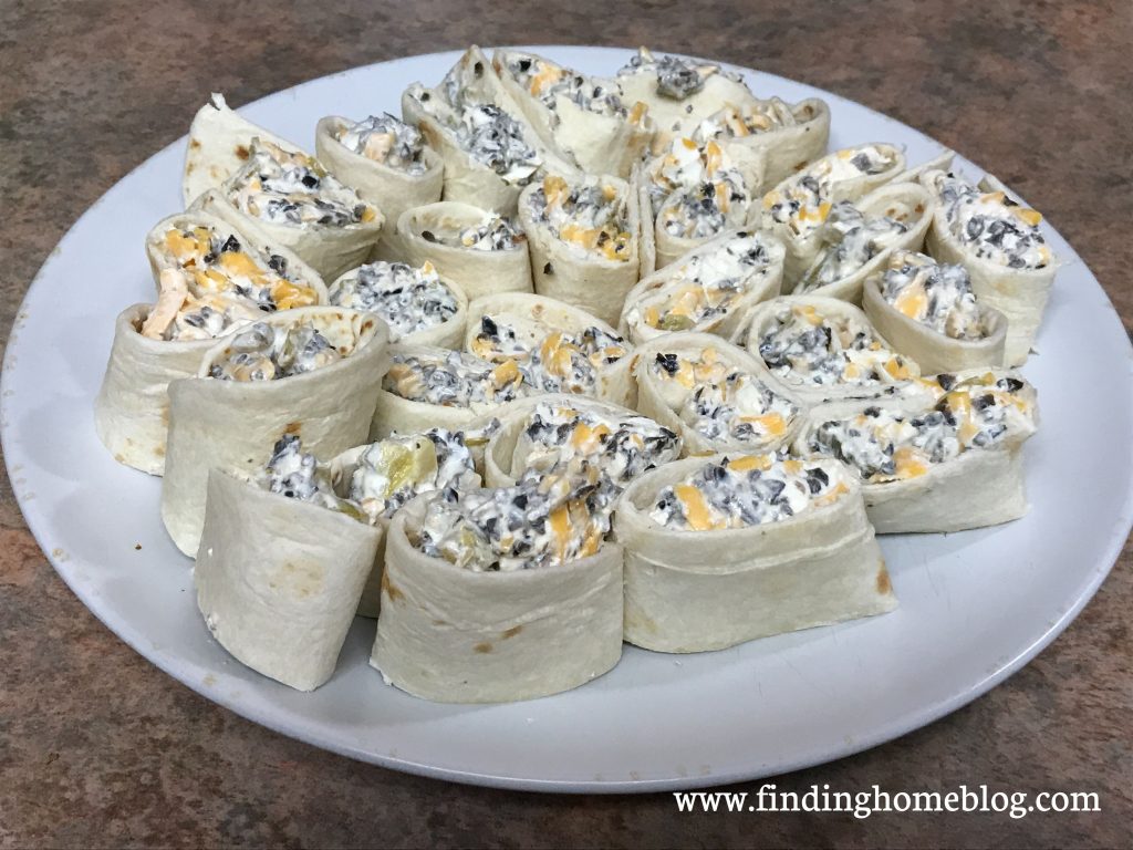 A plate of pinwheels - an appetizer made from tortillas rolled around a cream cheese filling