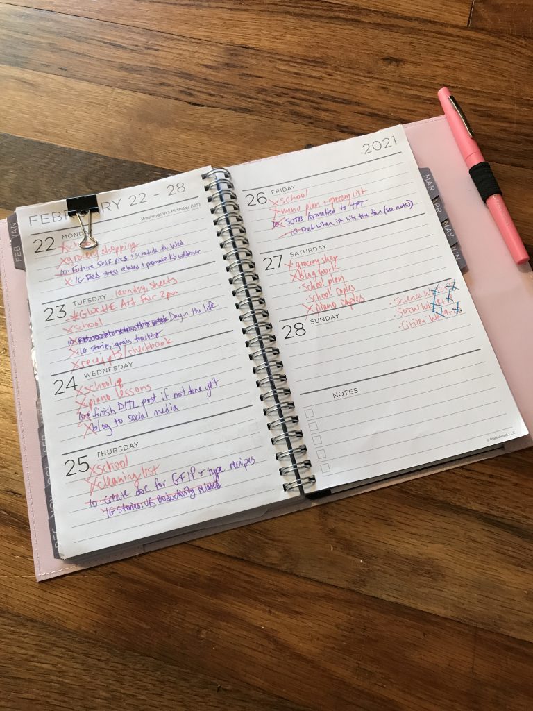 Picture of a planner filled out with various activities.