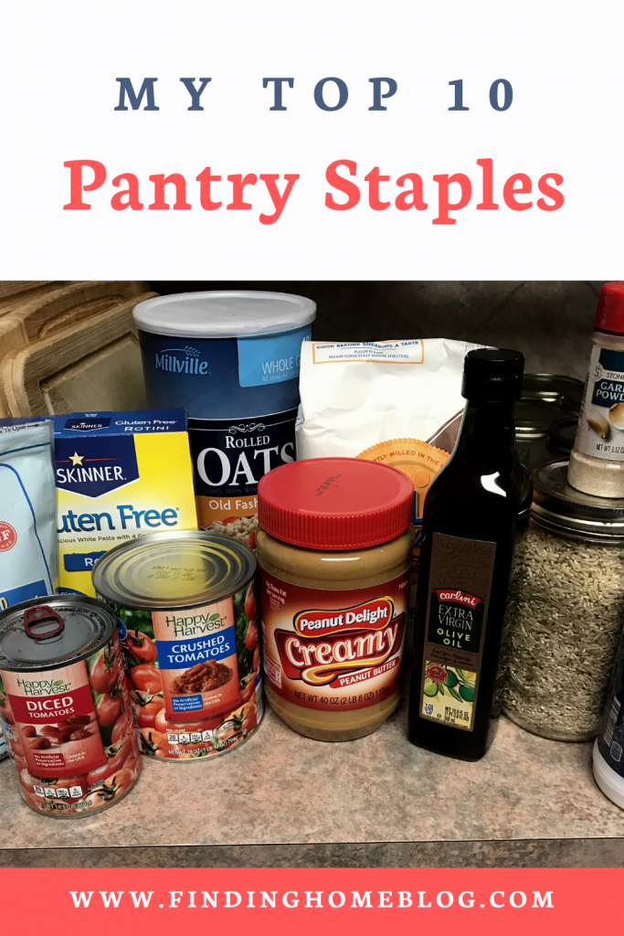 A variety of pantry goods sitting on a kitchen counter. A banner reads "My Top 10 Pantry Staples"